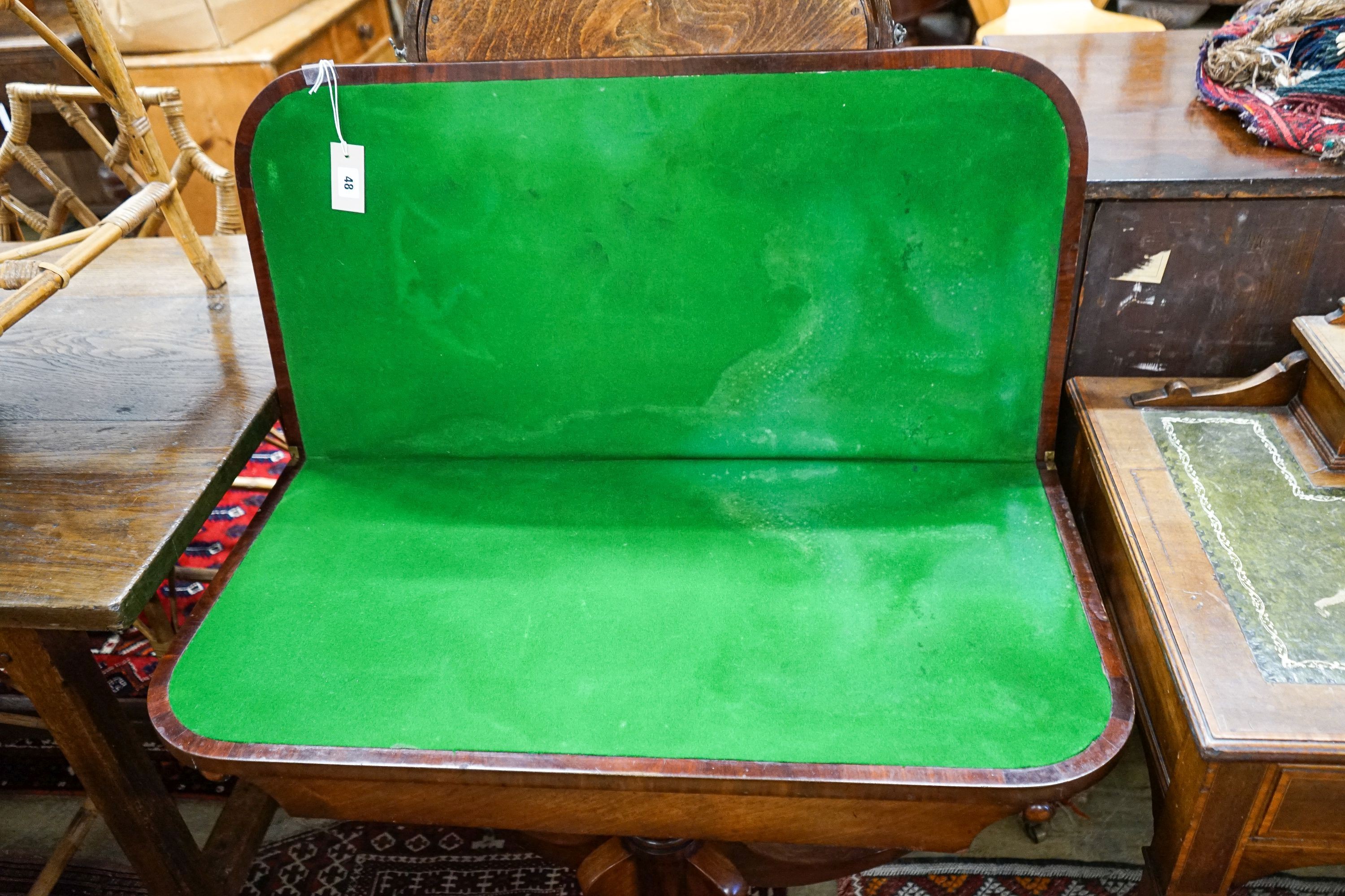 A late Regency mahogany banded folding card table, width 89cm, depth 44cm, height 70cm